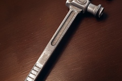 spiritusloci_a_monkey_wrench_on_a_table_e5016c95-756e-4c69-940b-a996fcd210b3